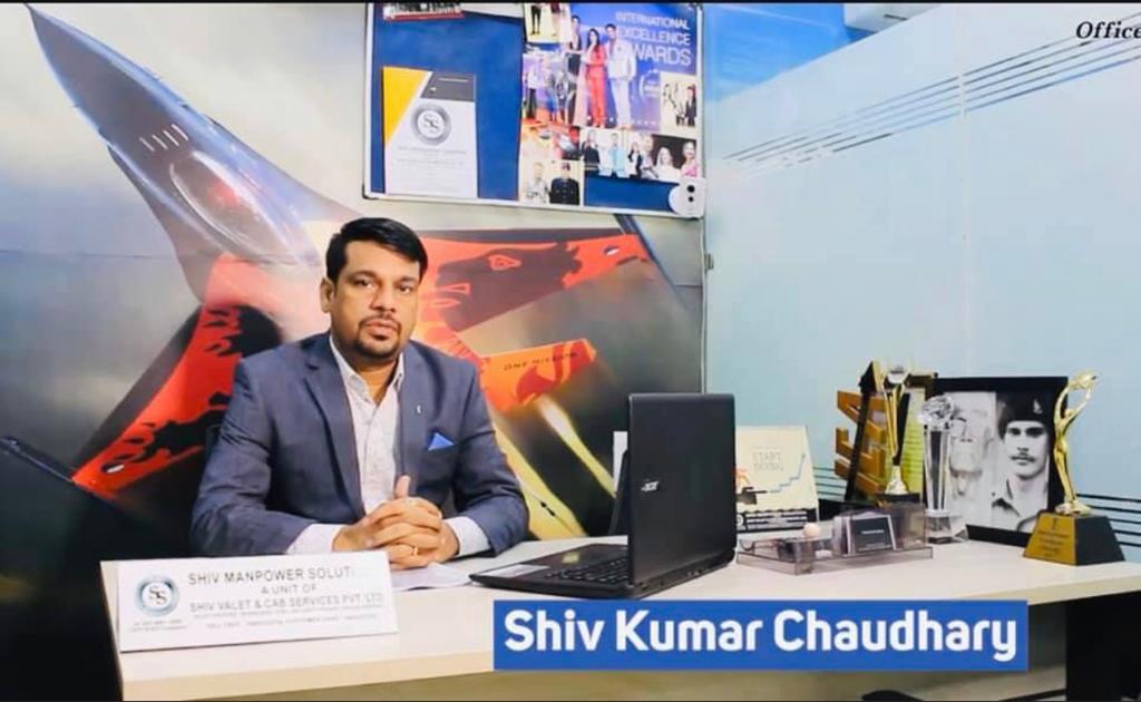 Shiv Kumar Chaudhary, Founder of Shiv Manpower Solutions, at his office with awards